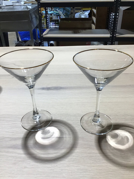 set of two gold rimmed martini glasses