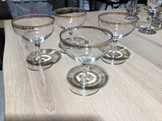 set of four gold etched retro champagne glasses